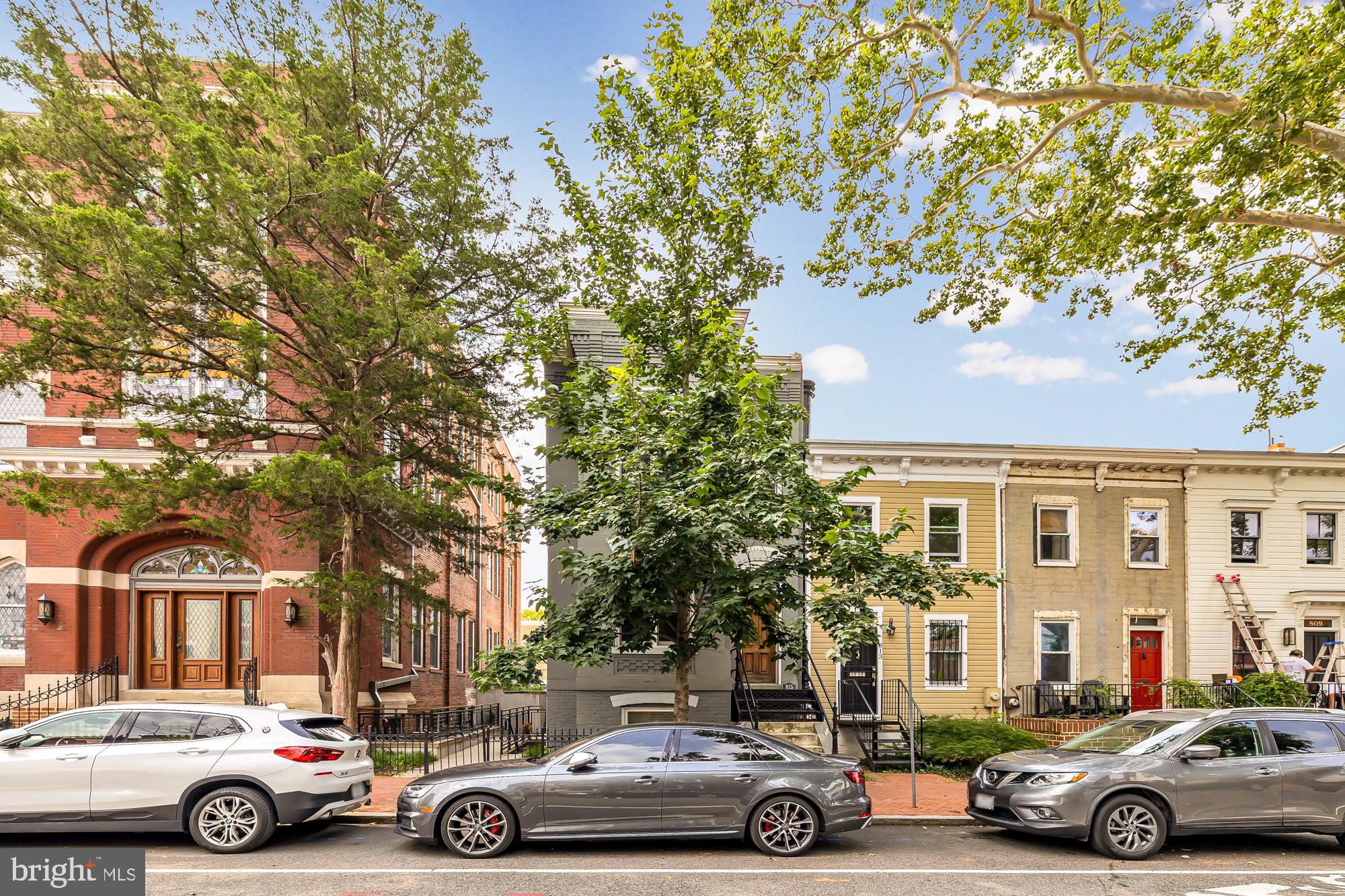 819 D Street Northeast, Unit 8 Washington, DC 20002 - Photo 5 of 26 a car parked in front of a building