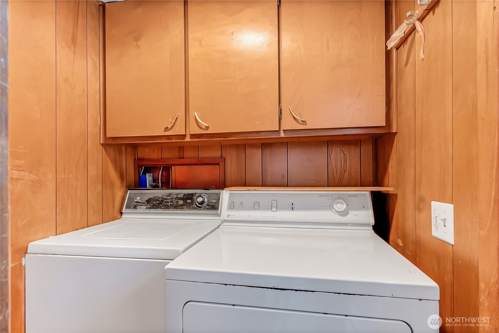 9314 Canyon Road East, Unit 34 Puyallup, WA 98371 - Photo 13 of 18 a close up view of washer and dryer