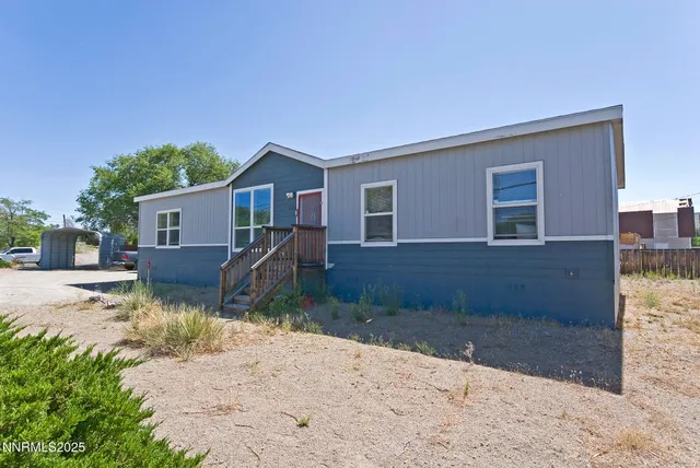 a house view with a outdoor space