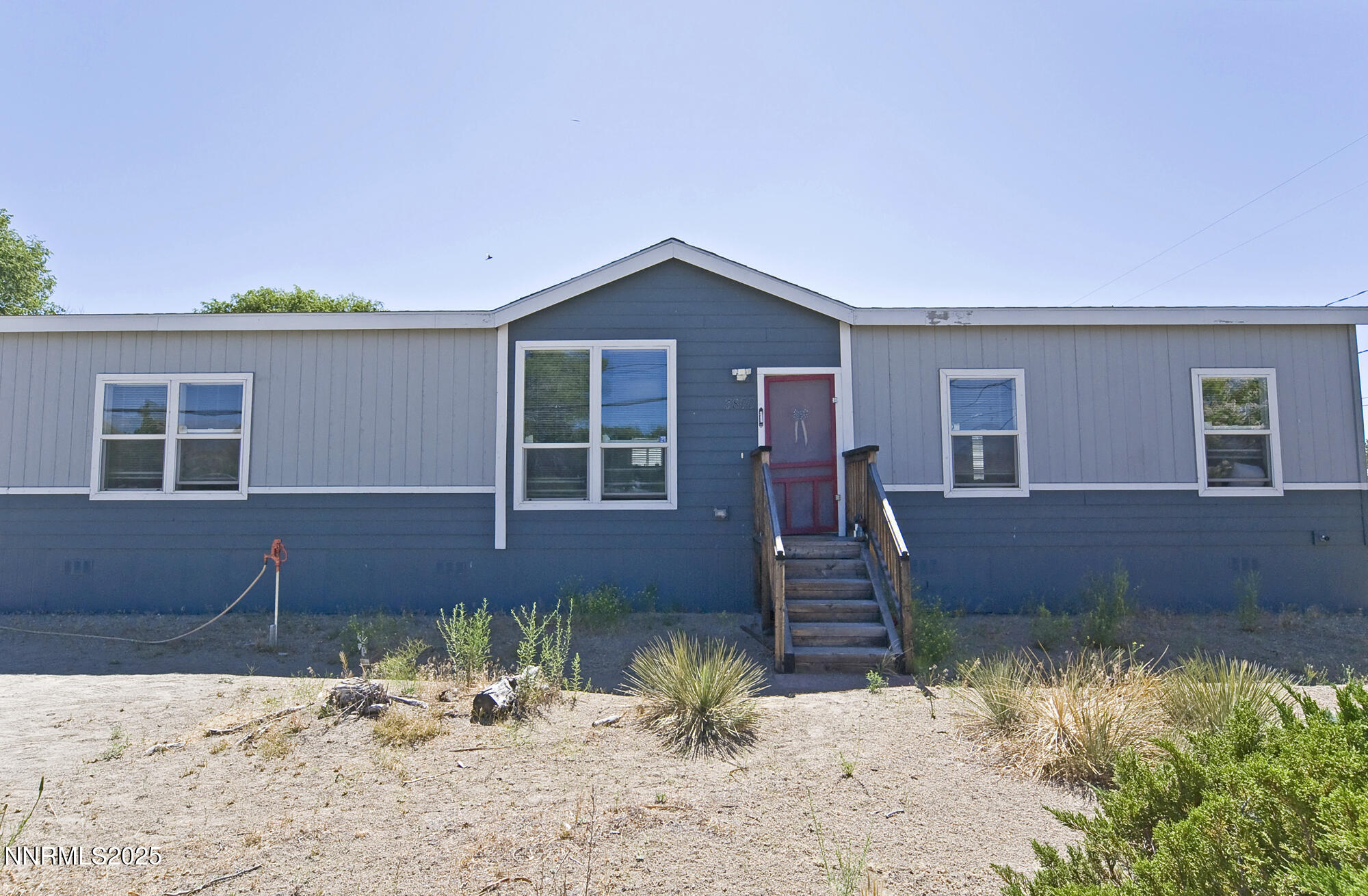 3800 Sandpiper Drive Reno, NV 89508 - Photo 15 of 18 a front view of a house with garden
