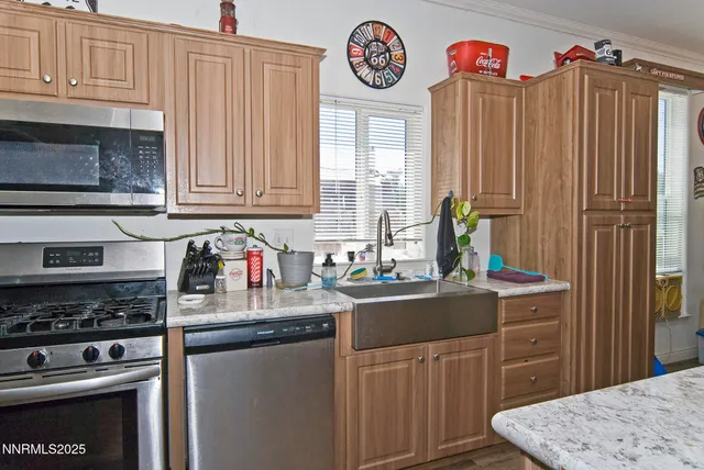 a kitchen with a stove and a refrigerator