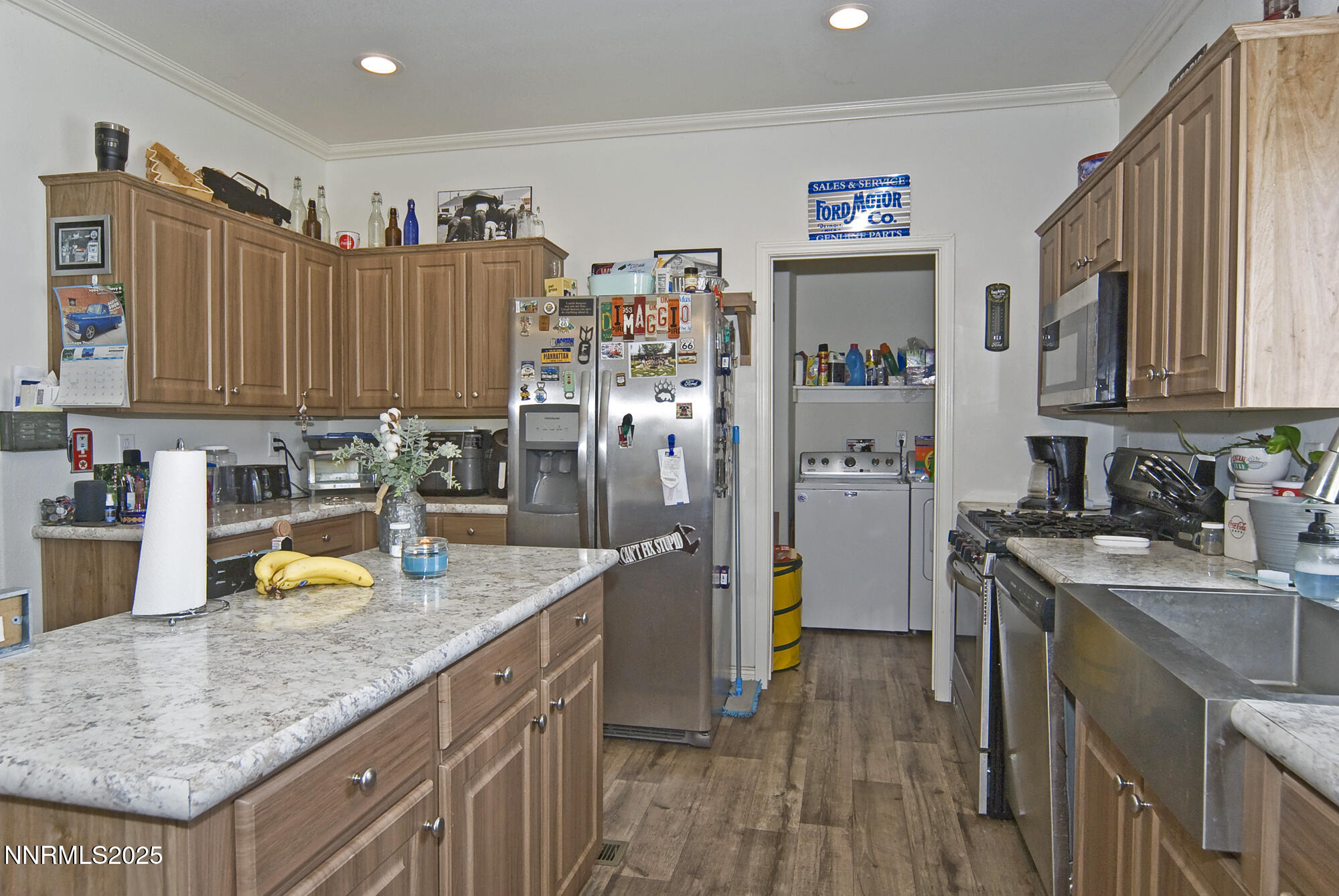3800 Sandpiper Drive Reno, NV 89508 - Photo 8 of 18 a kitchen with granite countertop a sink a counter top space and stainless steel appliances