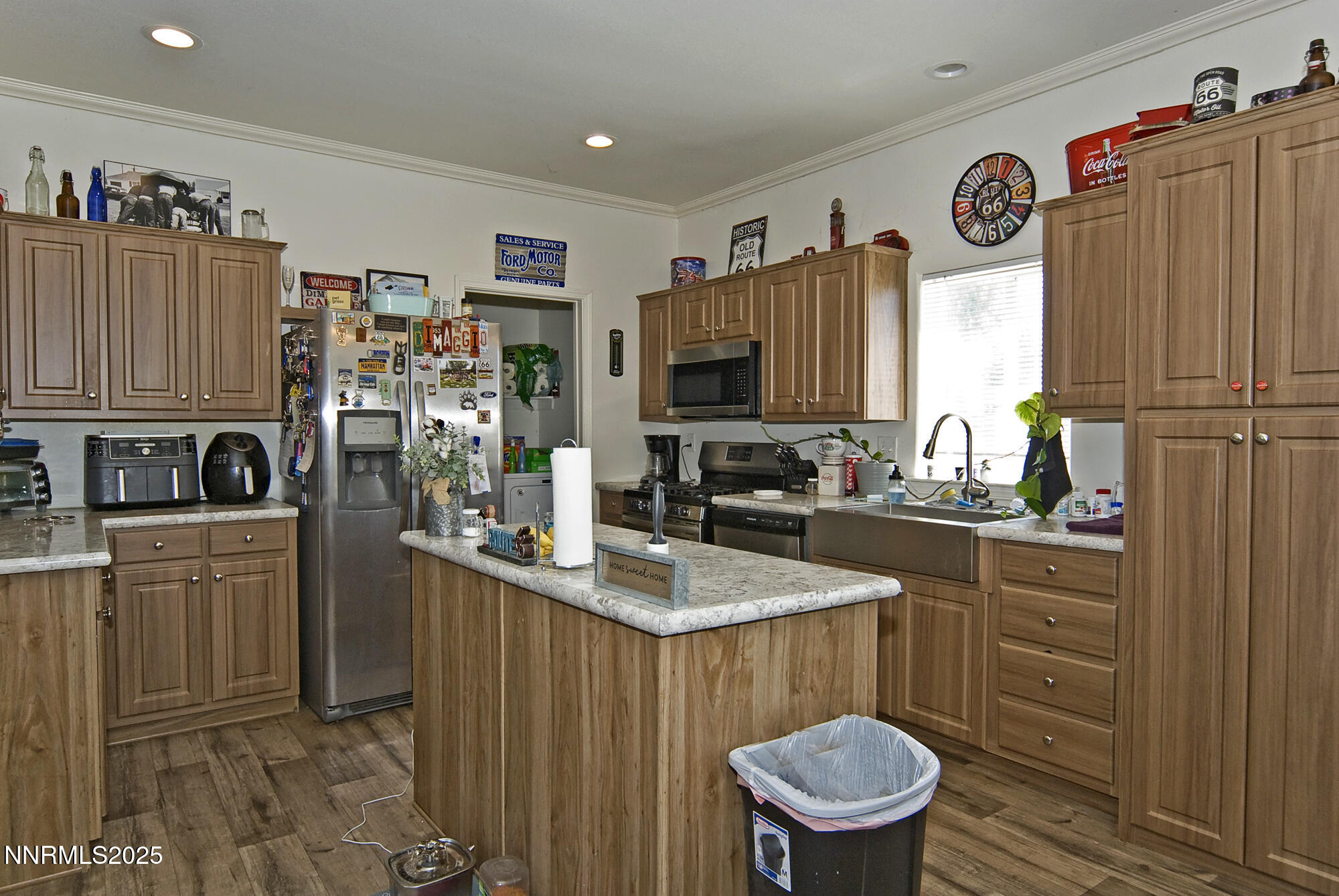 3800 Sandpiper Drive Reno, NV 89508 - Photo 9 of 18 a kitchen with stainless steel appliances a refrigerator sink and cabinets