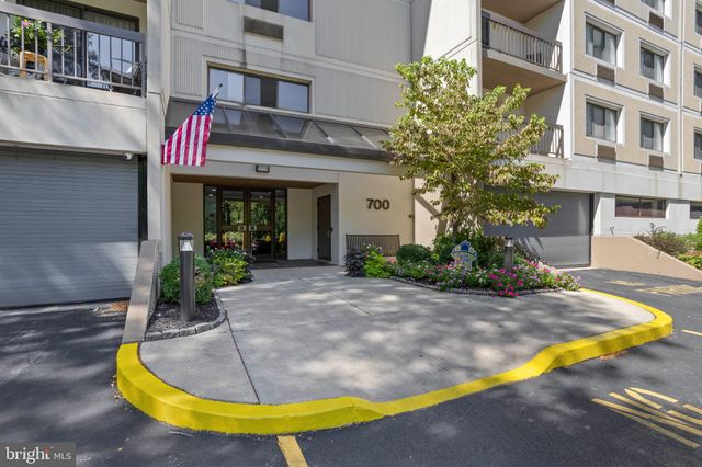 a bathroom with 2 sink and a mirror