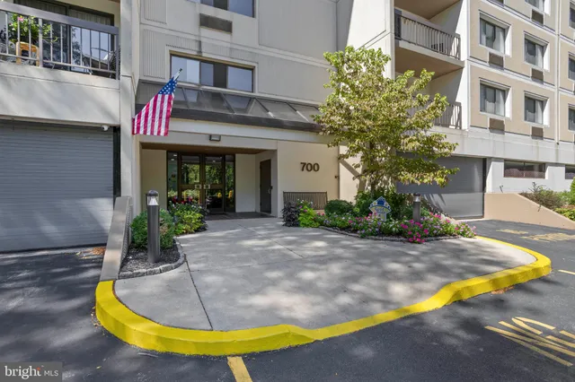 a bathroom with 2 sink and a mirror