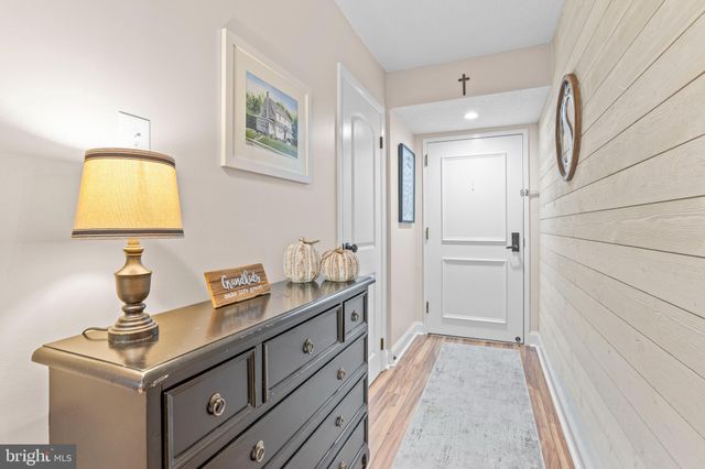 a utility room with sink dryer and washer