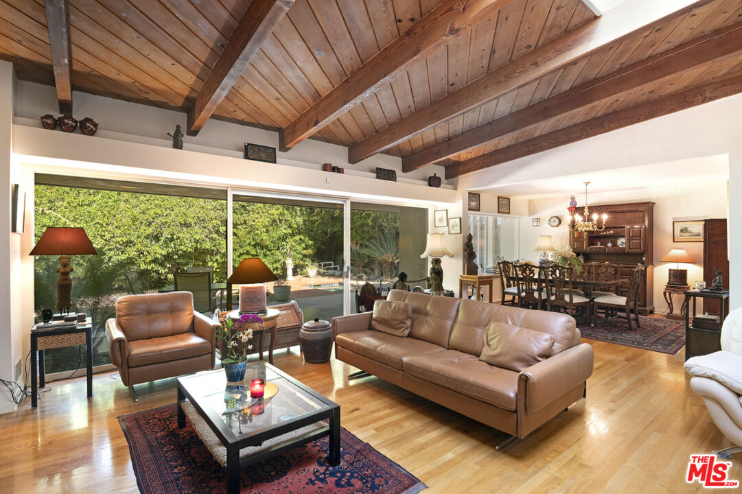 9527 Oakmore Road Los Angeles, CA 90035 - Photo 1 of 29 a building outdoor space with patio furniture