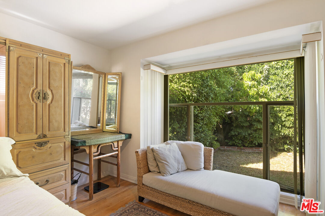 9527 Oakmore Road Los Angeles, CA 90035 - Photo 17 of 29 a living room with furniture and windows