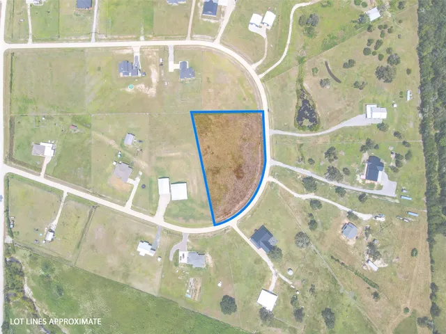 a picture of a bathroom with mirror and door