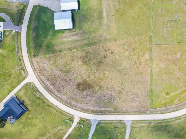 a view of a swimming pool with an outdoor seating