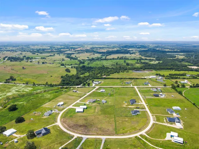 a view of a swimming pool with a terrace