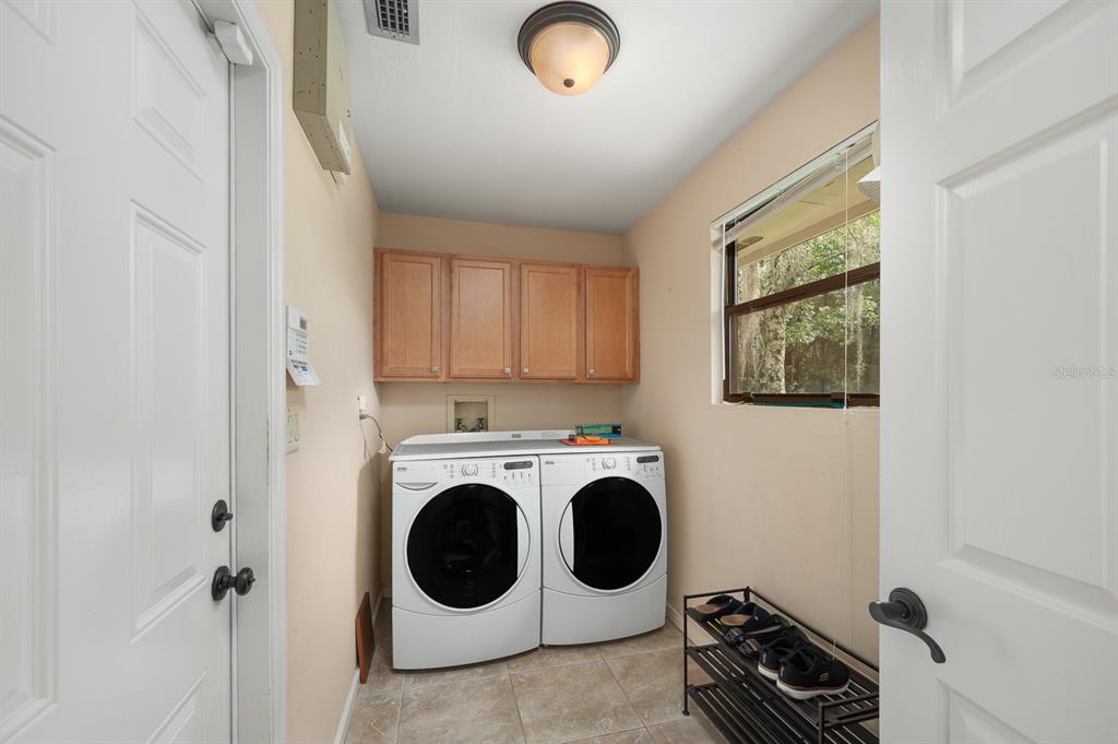 7201 Southwest 97th Lane Gainesville, FL 32608 - Photo 41 of 68 a utility room with dryer and washer