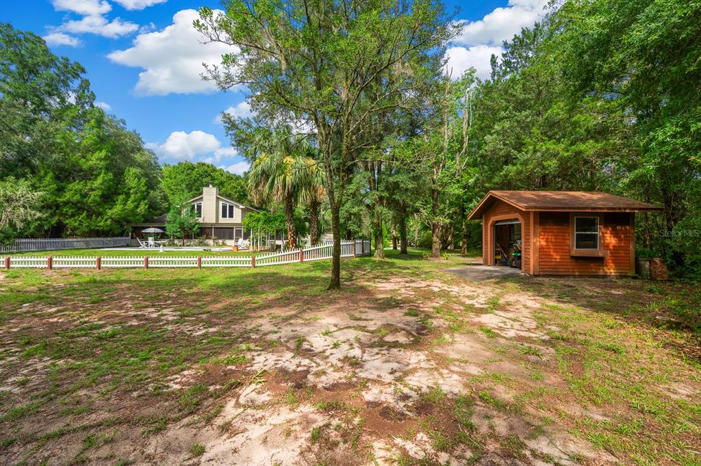 7201 Southwest 97th Lane Gainesville, FL 32608 - Photo 55 of 68 a view of a house with a big yard