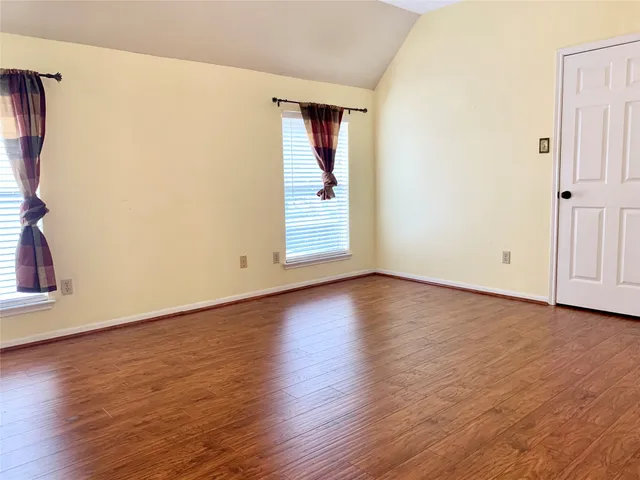a bathroom with a sink vanity and mirror