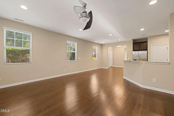 a kitchen with stainless steel appliances granite countertop a sink stove microwave and cabinets