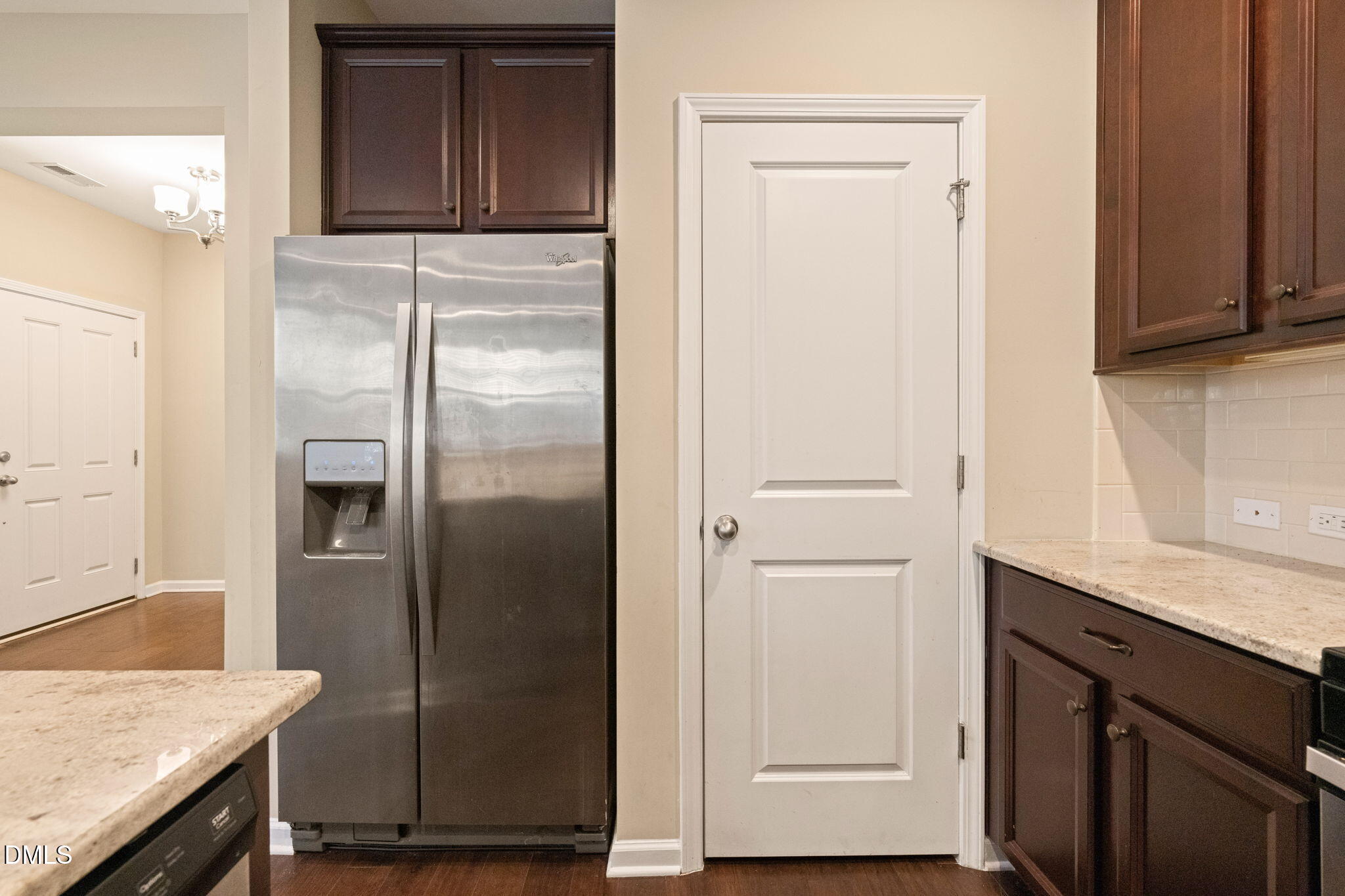 502 Libson Street Durham, NC 27703 - Photo 18 of 43 a kitchen with a refrigerator and cabinets