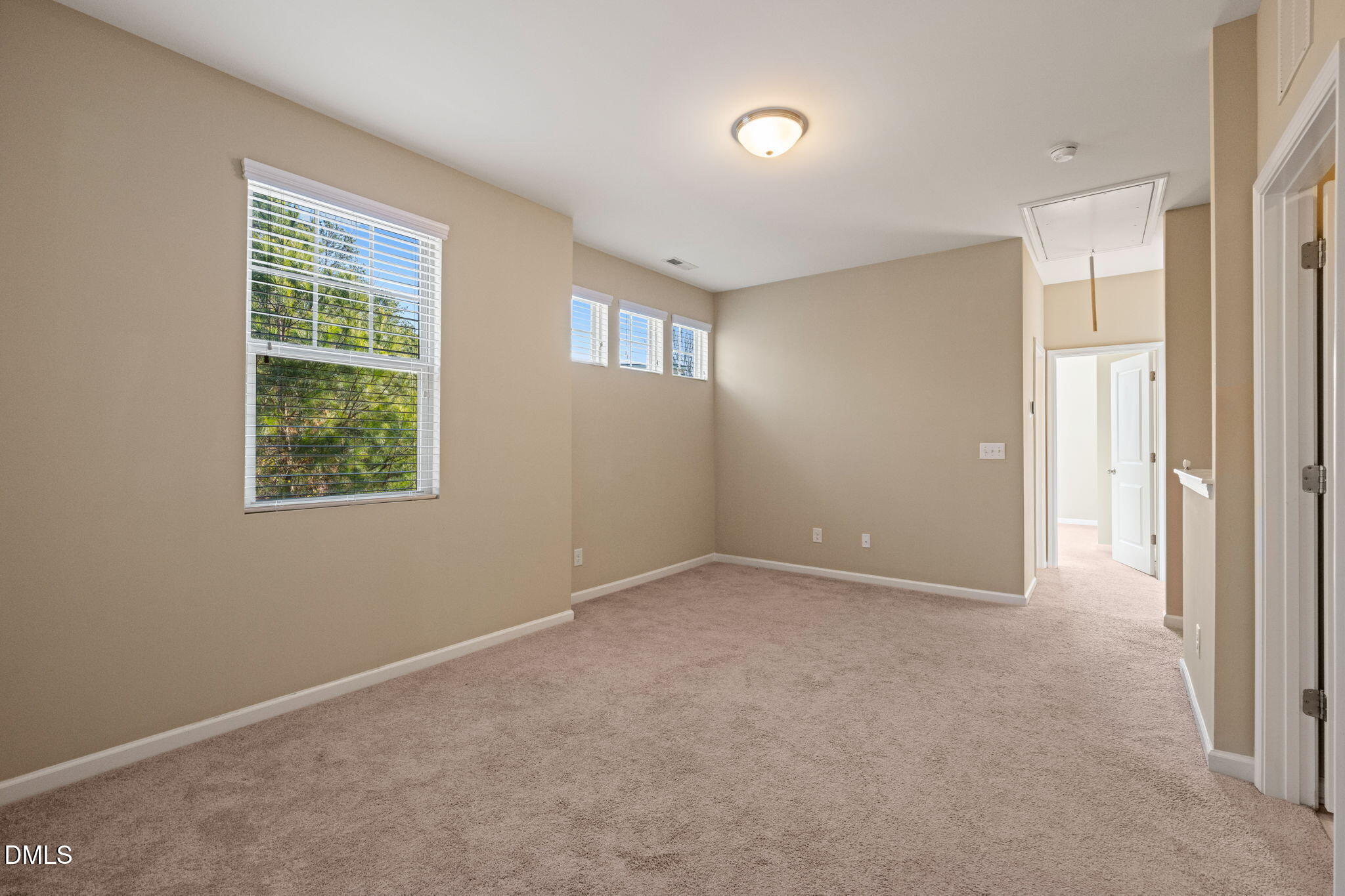 502 Libson Street Durham, NC 27703 - Photo 20 of 43 an empty room with windows