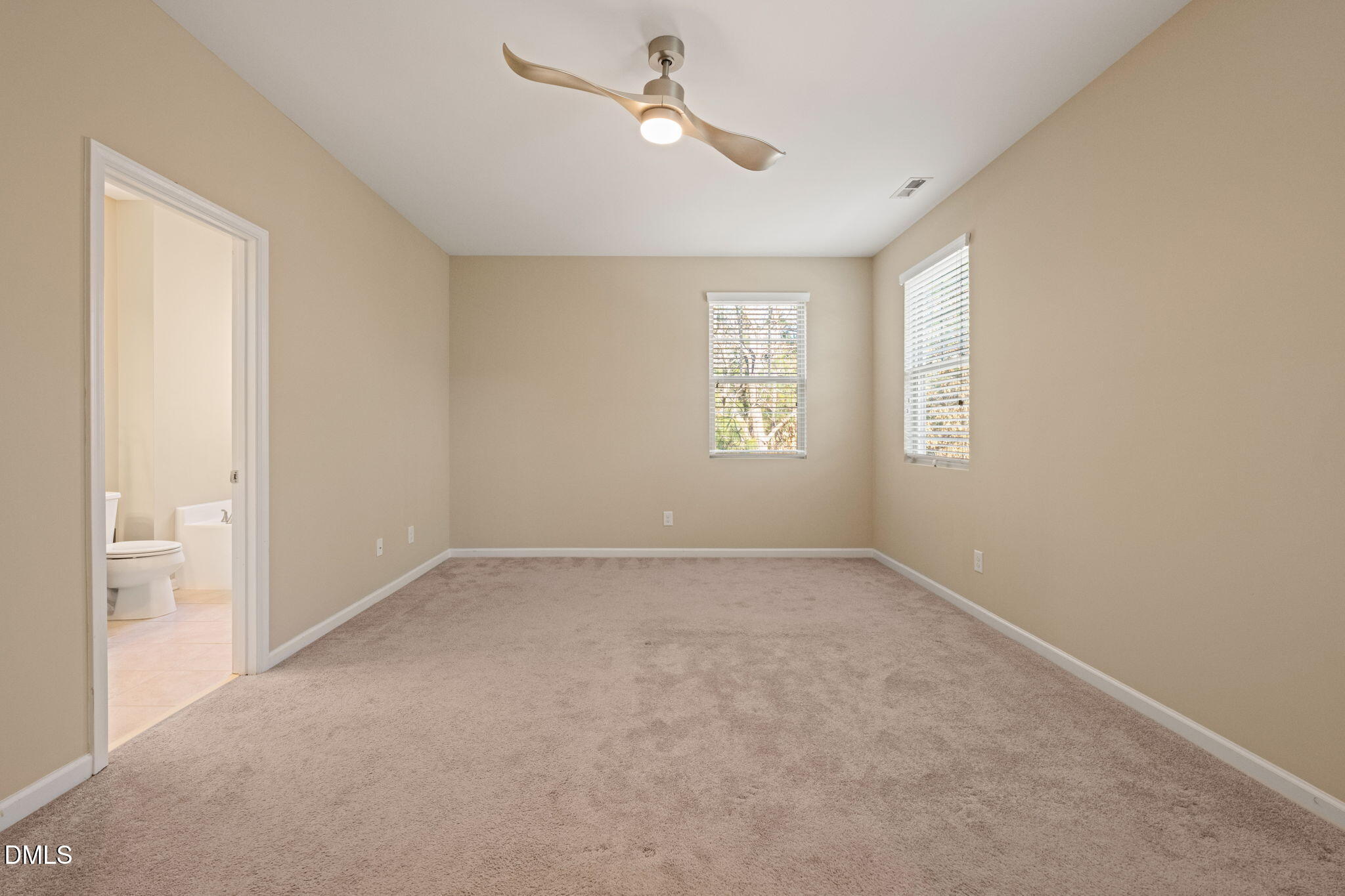 502 Libson Street Durham, NC 27703 - Photo 22 of 43 a view of empty room with windows