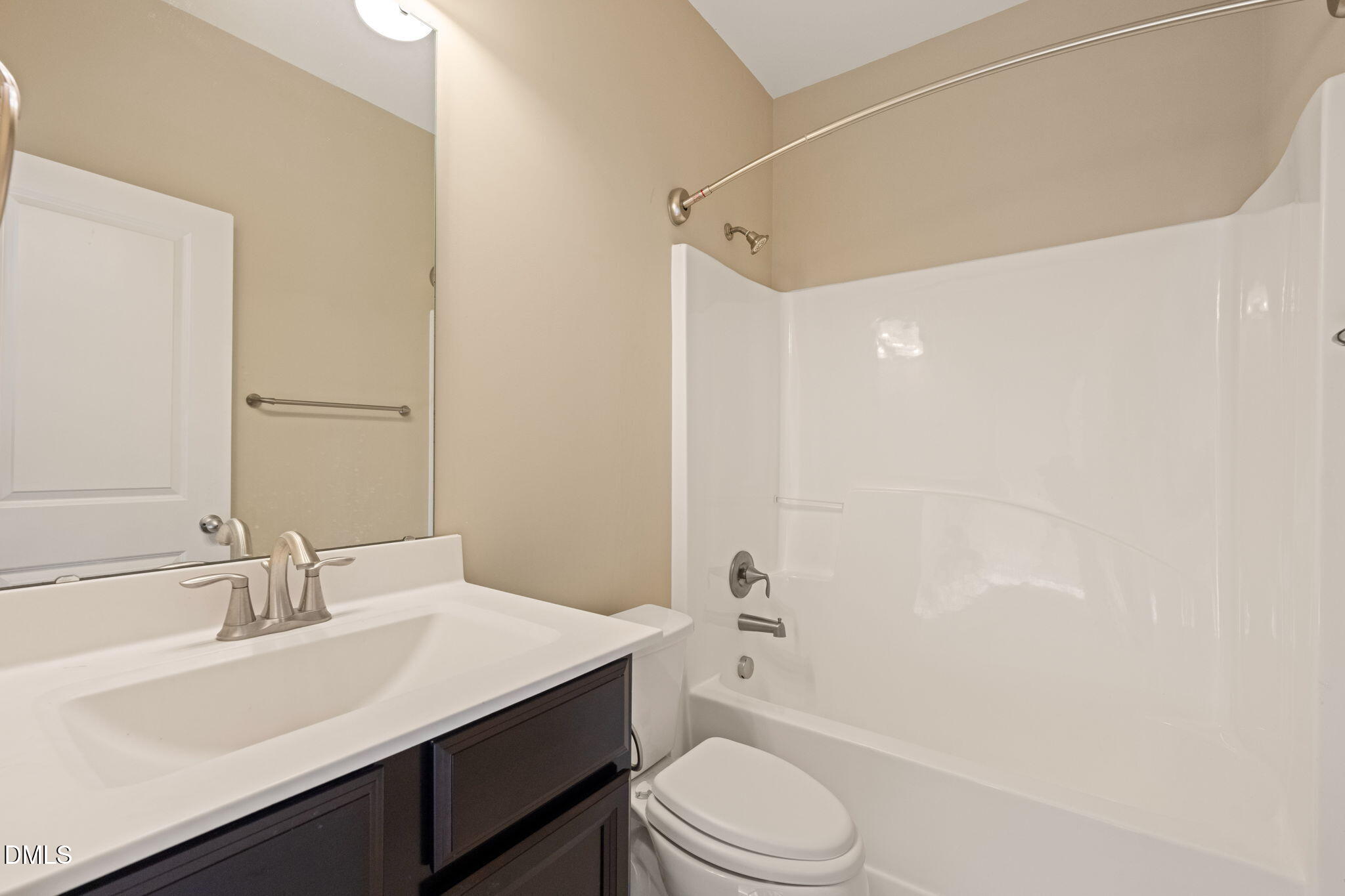 502 Libson Street Durham, NC 27703 - Photo 30 of 43 a bathroom with a sink a toilet and shower