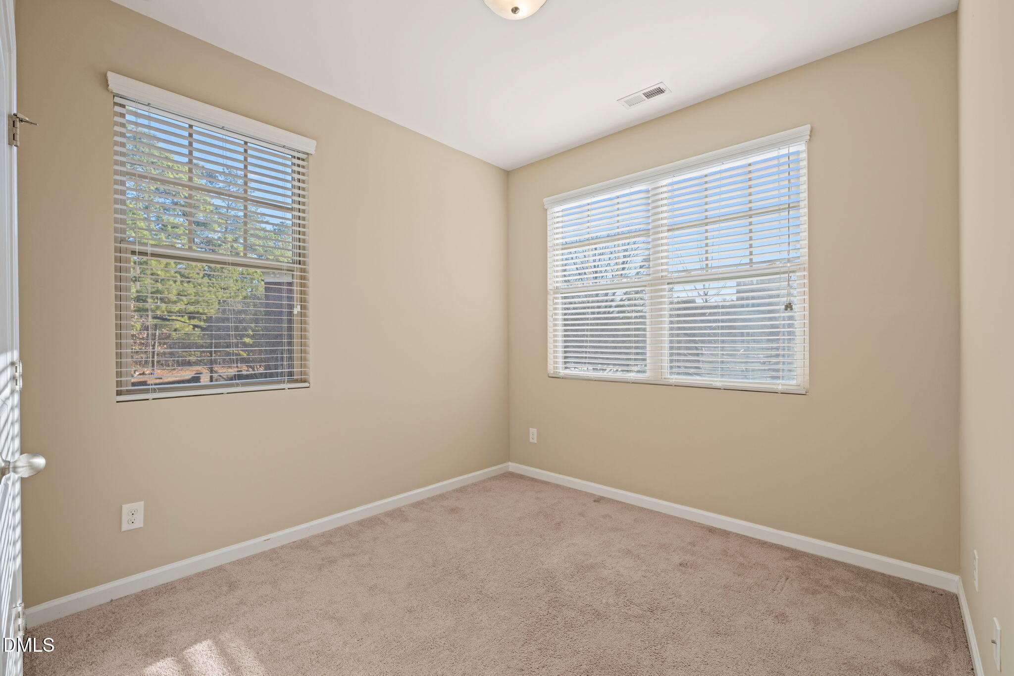 502 Libson Street Durham, NC 27703 - Photo 35 of 43 a view of an empty room with a window