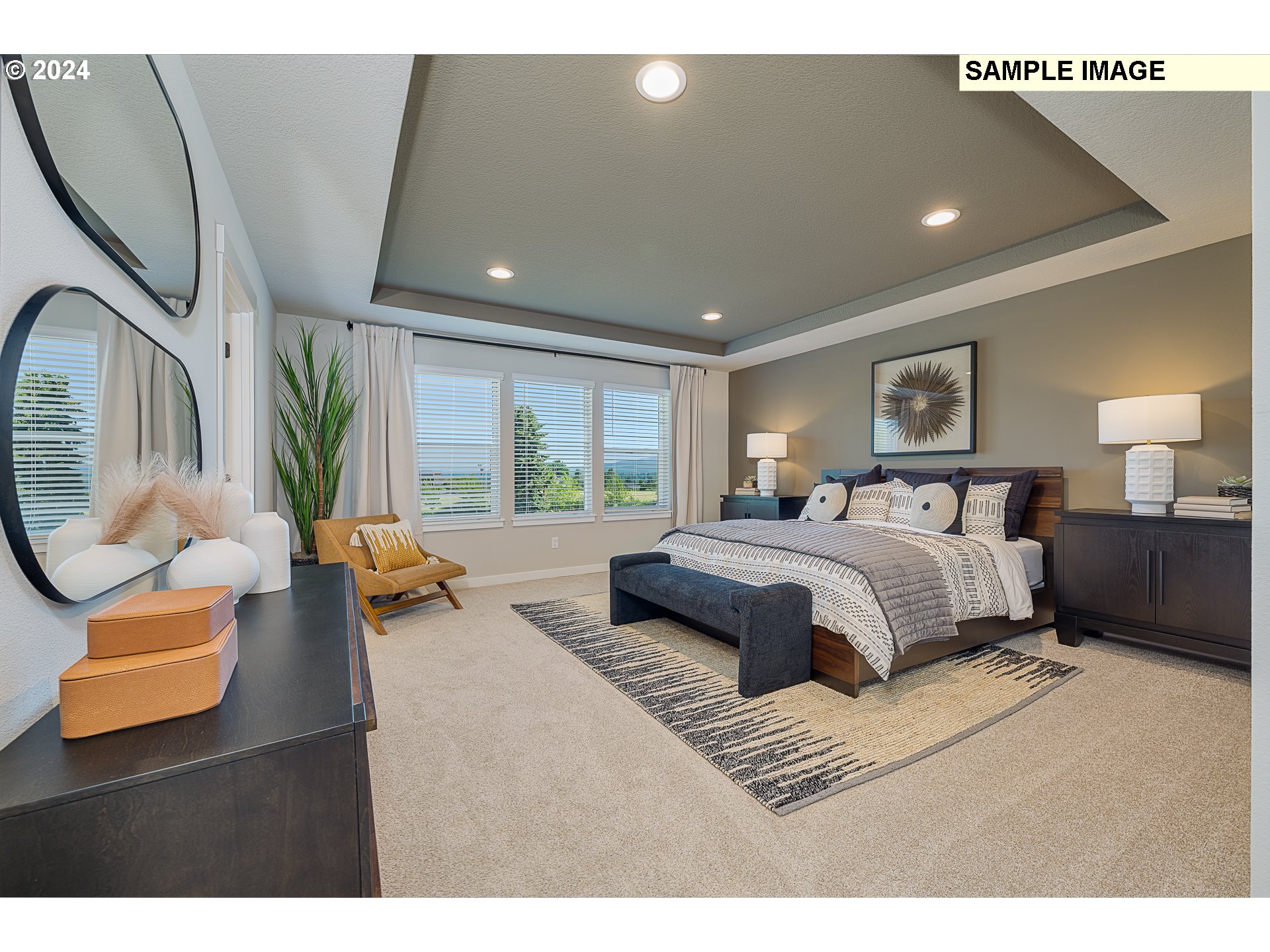 103 South 90th Place, Unit 131 Ridgefield, WA 98642 - Photo 17 of 32 a bedroom with a large bed and a large window