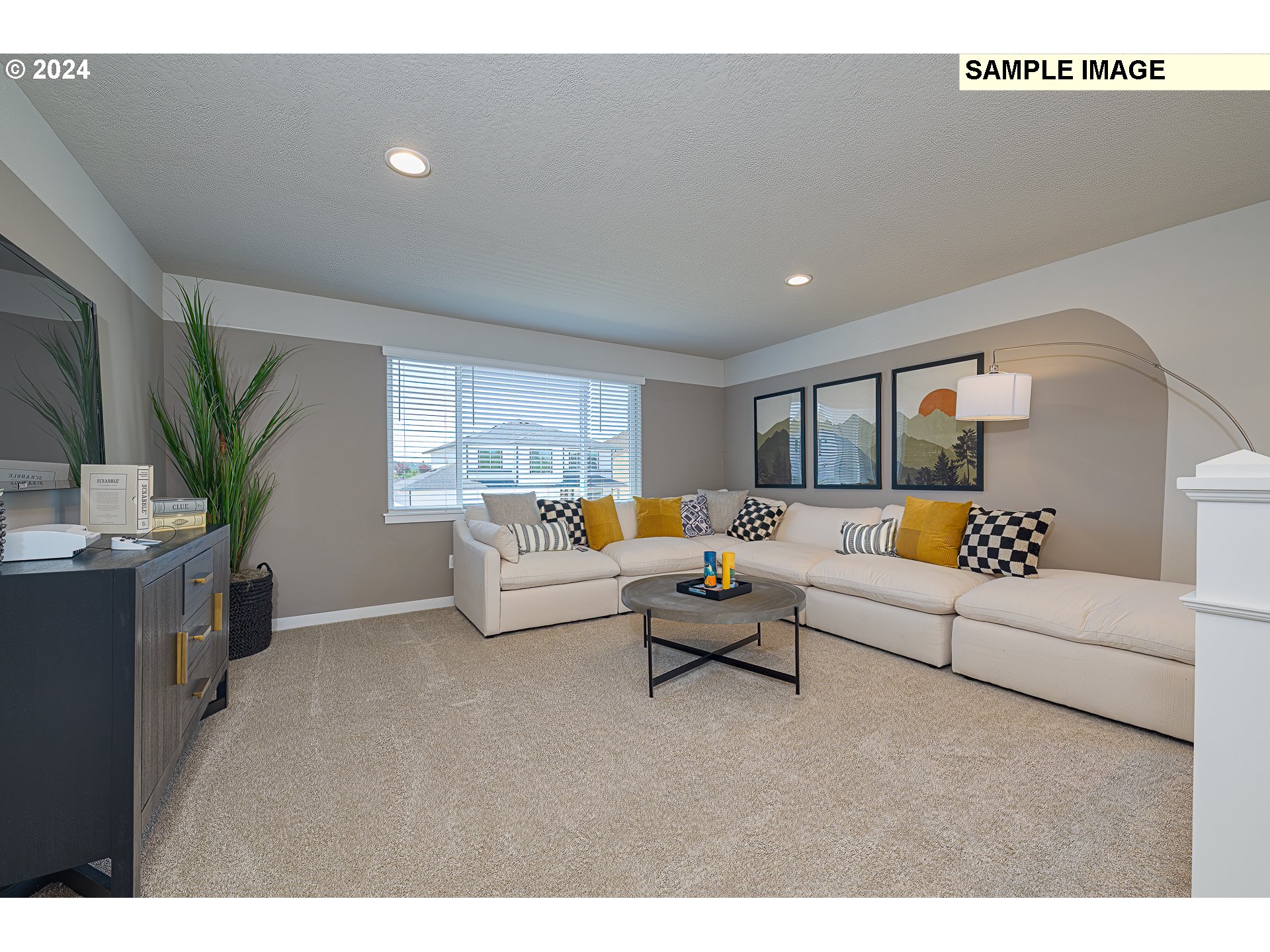 103 South 90th Place, Unit 131 Ridgefield, WA 98642 - Photo 23 of 32 a living room with furniture and a large window