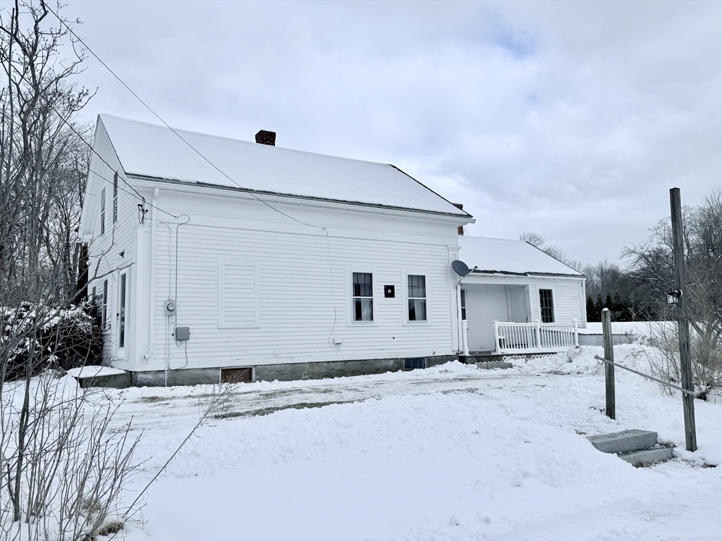 1 Barre Rd Cutoff Hubbardston, MA 01452 - Photo 6 of 41 a front view of a house with a yard