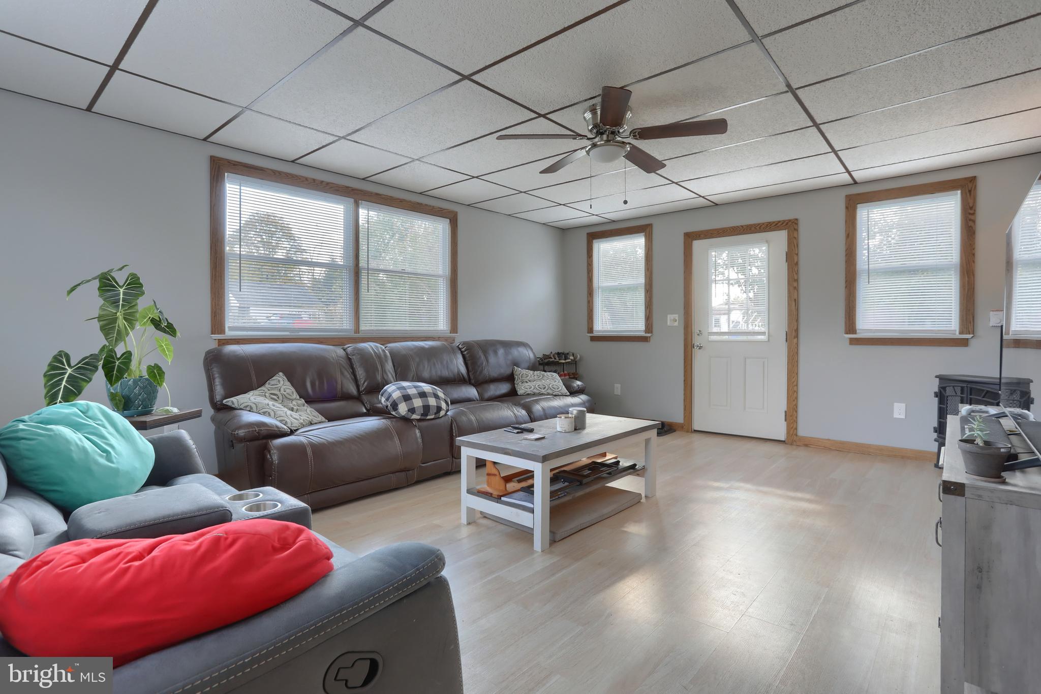 2010 Allegheny Avenue Lebanon, PA 17042 - Photo 15 of 34 a living room with furniture a chandelier and a window