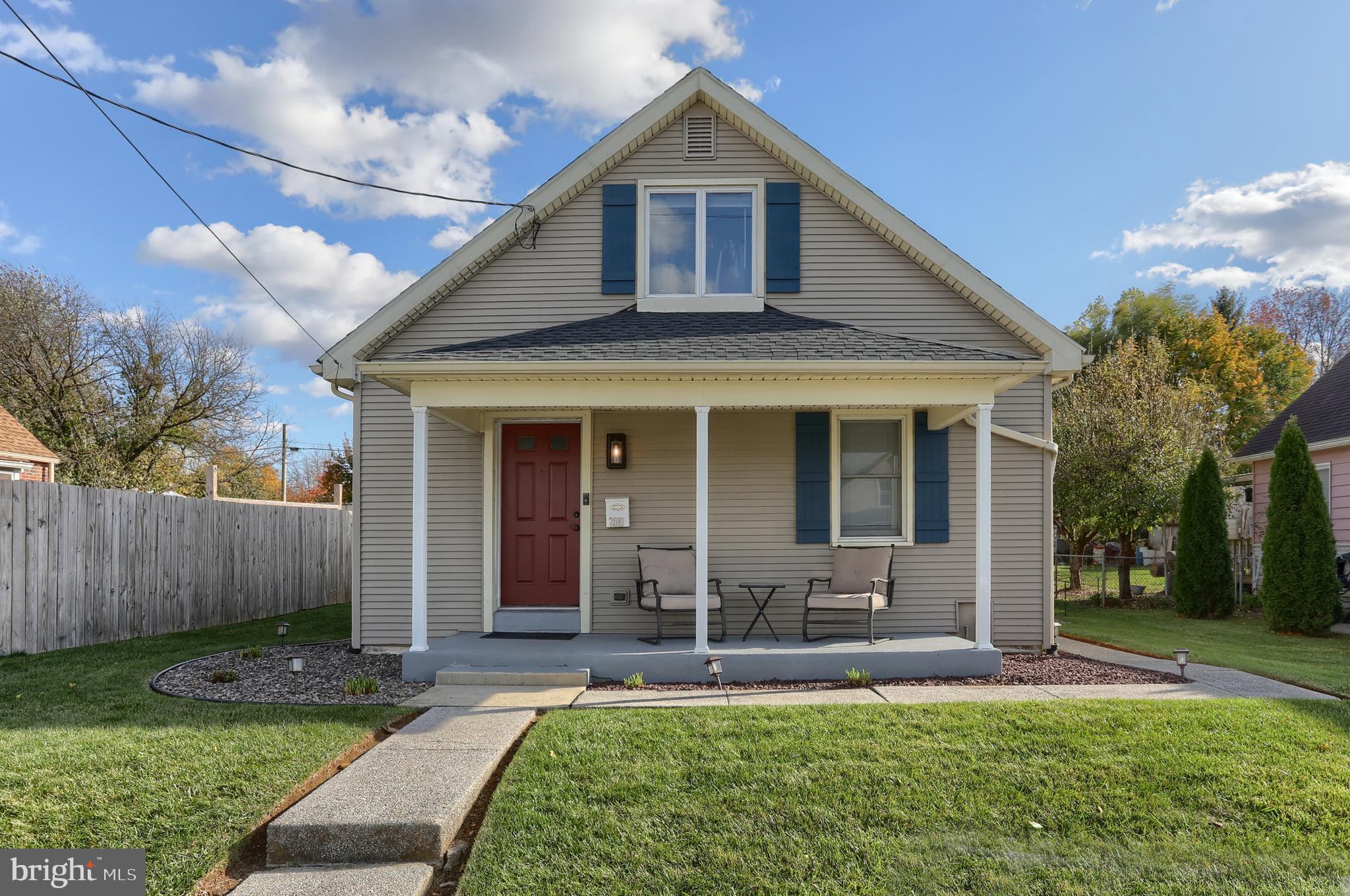 2010 Allegheny Avenue Lebanon, PA 17042 - Photo 34 of 34 a front view of a house with a yard table and chairs