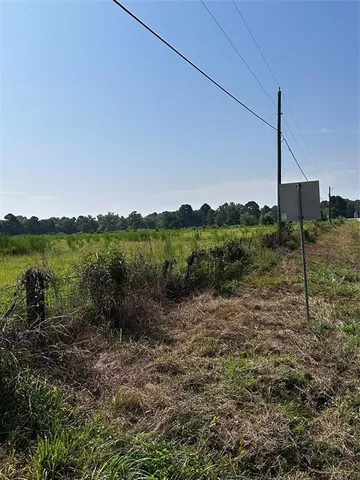 a view of a lake with a park