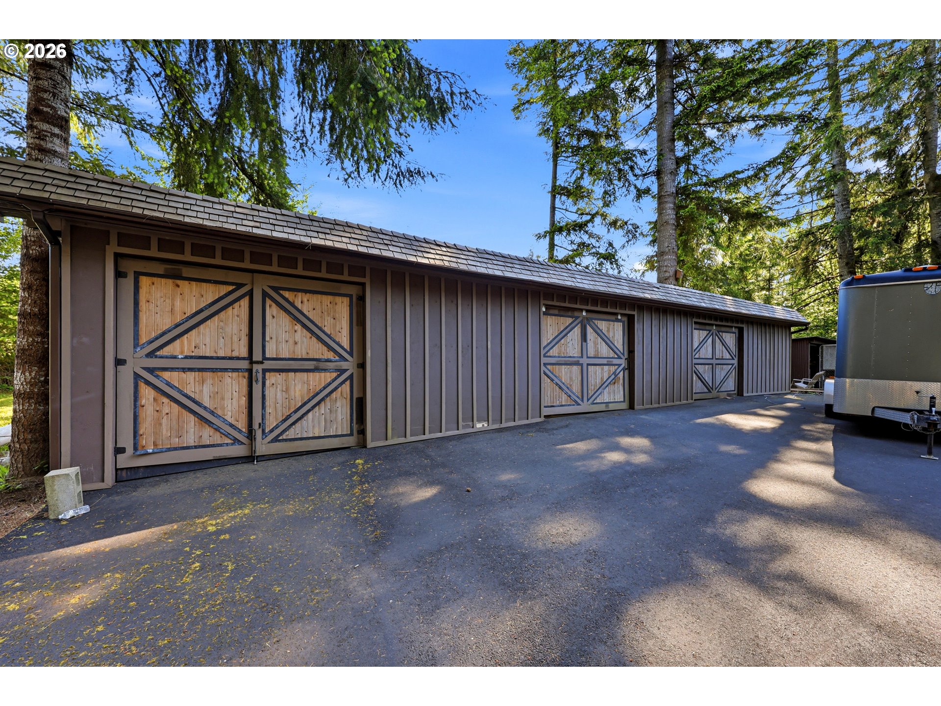 390 Spruce Creek Road Longview, WA 98632 - Photo 37 of 45 a view of a house with a outdoor space