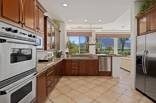 an outdoor space with pool and furniture
