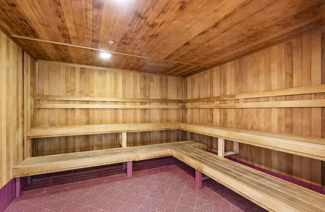 a room with table soccer and large windows