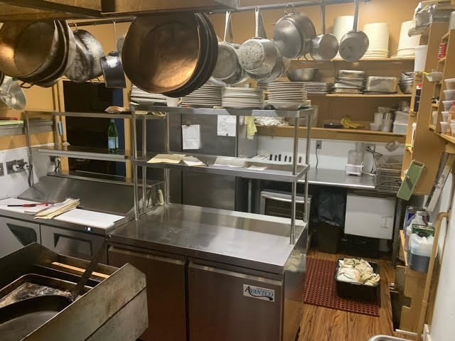 197 East Main Street, Unit 1 & 2 Gloucester, MA 01930 - Photo 11 of 32 a kitchen with a sink and a stove