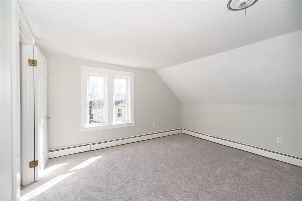 197 East Main Street, Unit 1 & 2 Gloucester, MA 01930 - Photo 25 of 32 an empty room with a empty space and window
