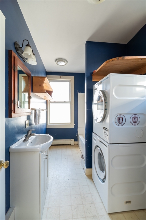 197 East Main Street, Unit 1 & 2 Gloucester, MA 01930 - Photo 28 of 32 a utility room with dryer and washer
