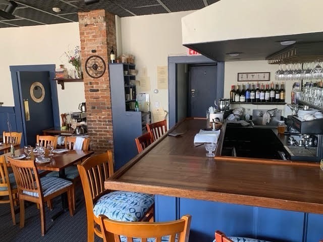 197 East Main Street, Unit 1 & 2 Gloucester, MA 01930 - Photo 7 of 32 a living room with furniture and a wooden floor
