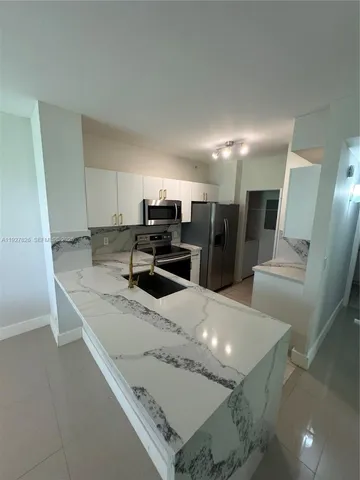 $1,795 | 8000 North Nob Hill Road, Unit 101, Tamarac, FL 33321