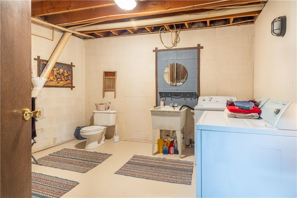 3348-3350 Springfield Pike Normalville, PA 15469 - Photo 15 of 25 a bathroom with a sink toilet and shower