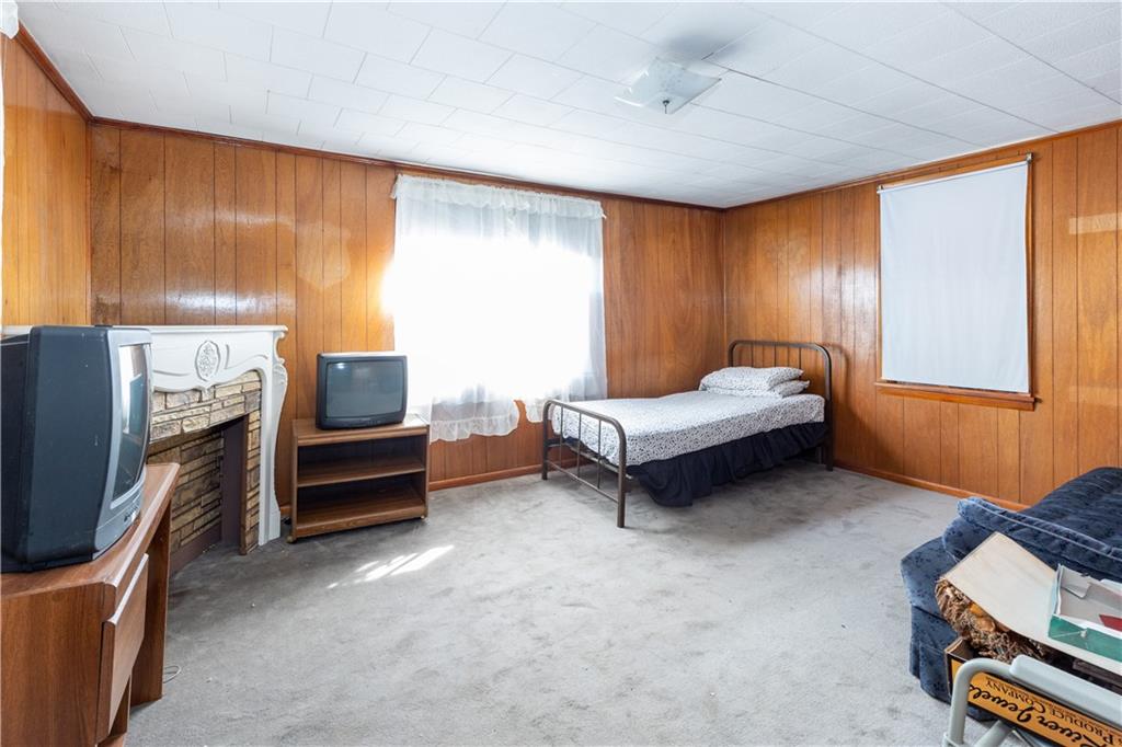 3348-3350 Springfield Pike Normalville, PA 15469 - Photo 22 of 25 a bedroom with furniture and a window