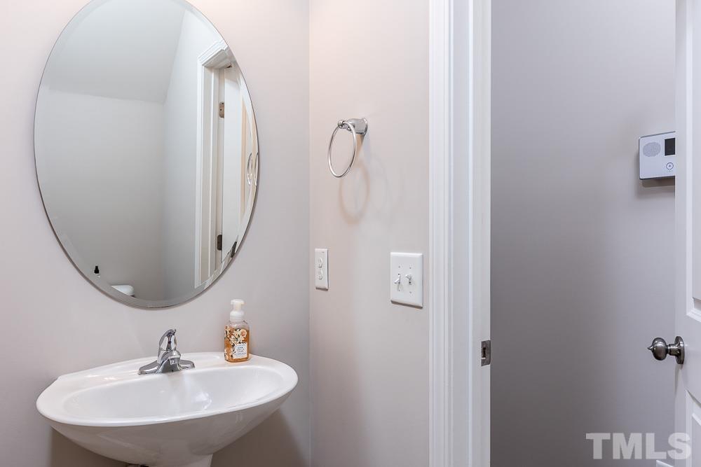 844 Horton Road, Unit 87 Durham, NC 27704 - Photo 14 of 21 a bathroom with a sink and a mirror
