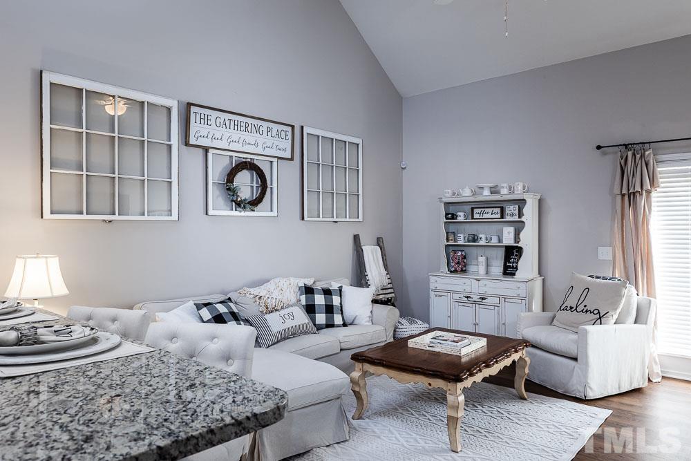 844 Horton Road, Unit 87 Durham, NC 27704 - Photo 4 of 21 a living room with furniture and a window
