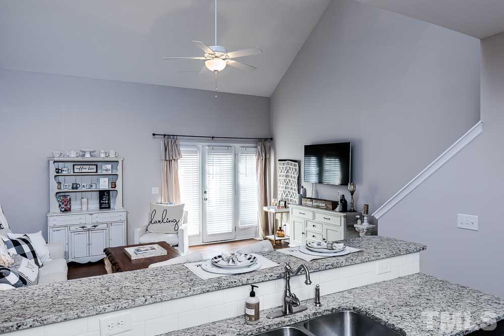 844 Horton Road, Unit 87 Durham, NC 27704 - Photo 5 of 21 a view of a livingroom with furniture and a table