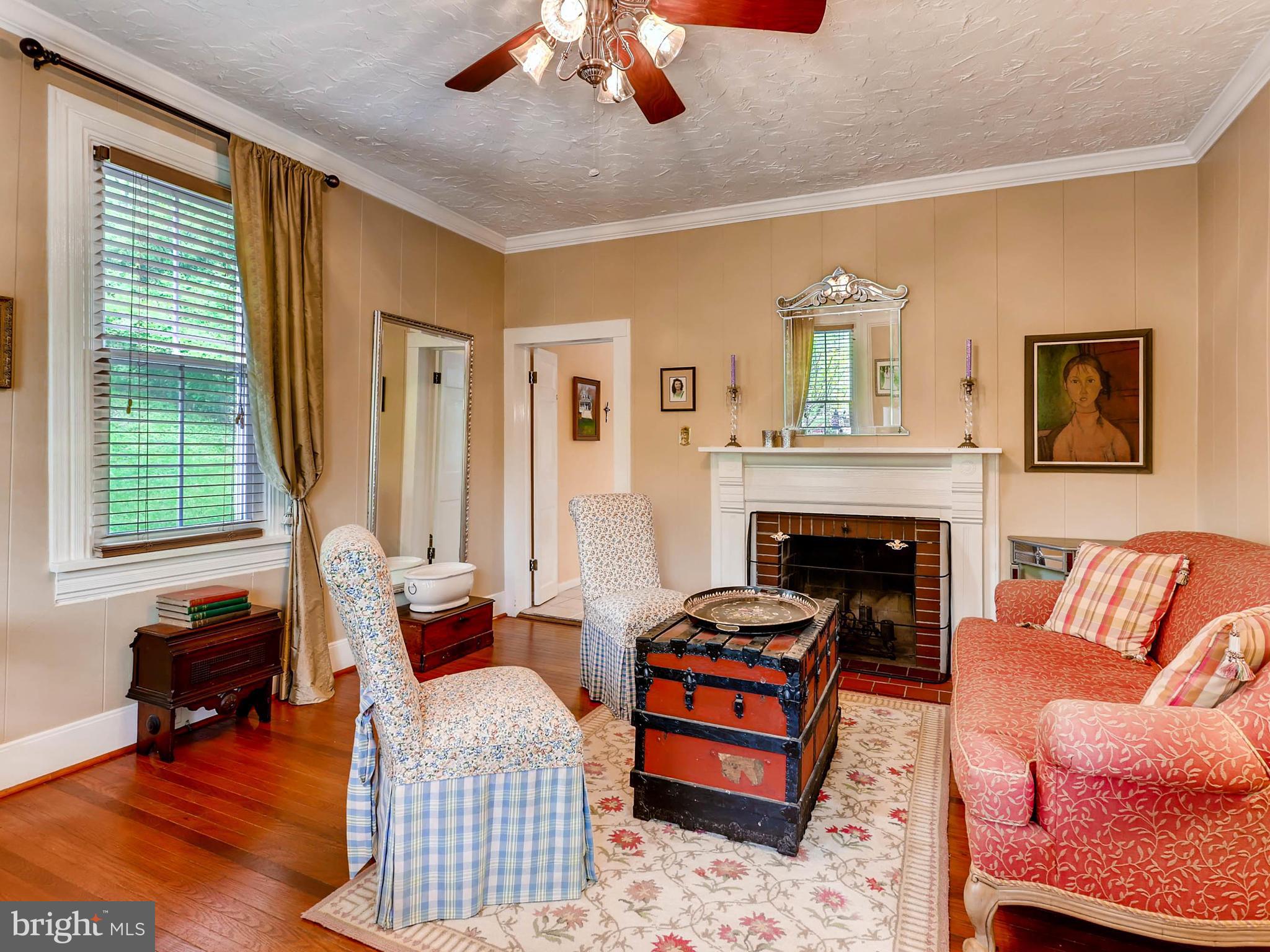 2016 Shepperd Road Monkton, MD 21111 - Photo 7 of 55 LIVING ROOM W FIREPLACE, HW FLOORS AND A FAN