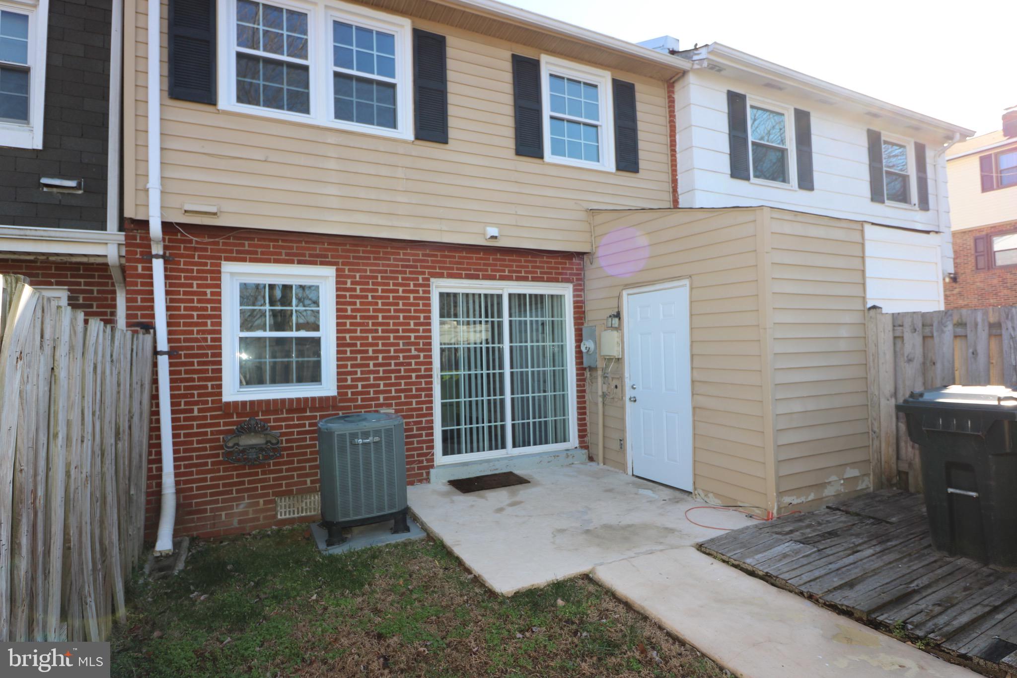 1717 Fort Henry Court Dumfries, VA 22026 - Photo 26 of 27 a front view of a house with a large window