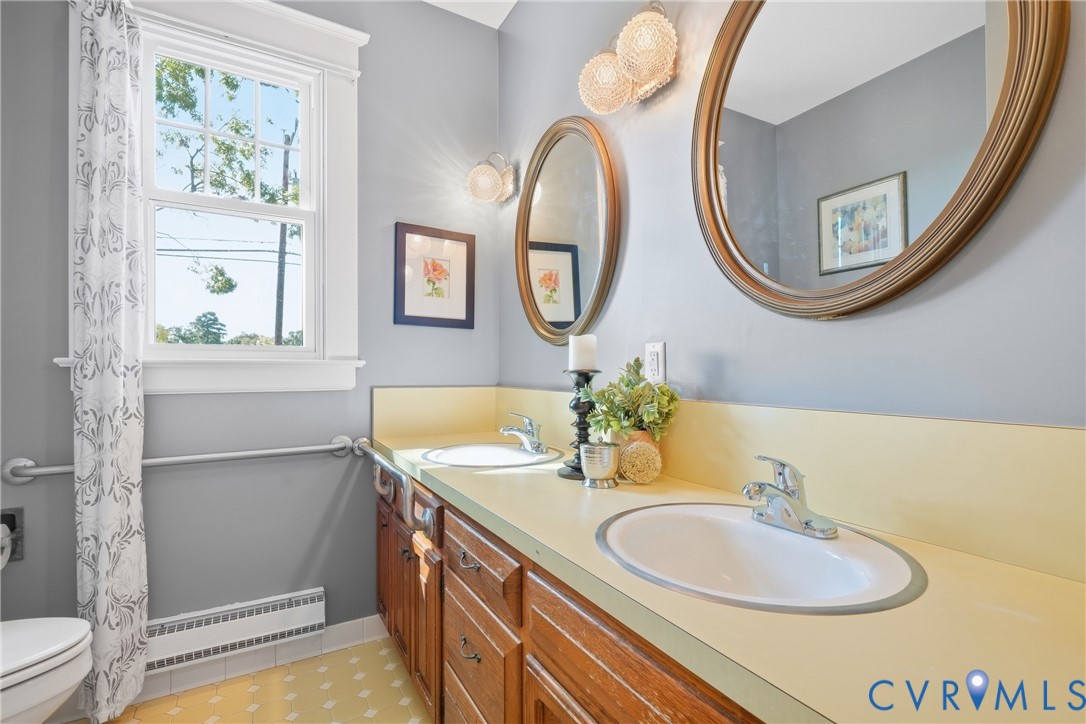 2406 McRae Road Richmond, VA 23235 - Photo 14 of 40 This hallway bathroom is conveniently accessible f