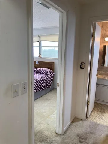 a view of bedroom with window