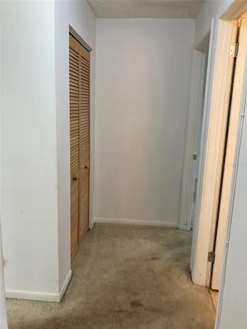 a bathroom with a sink toilet vanity and shower