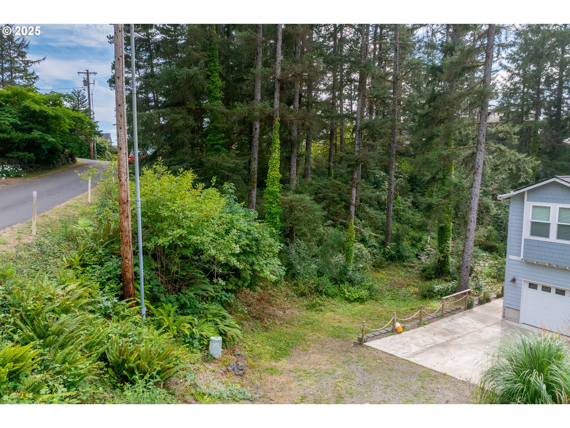 1503 Cherry Street Manzanita, OR 97130 - Photo 11 of 18 a view of a backyard