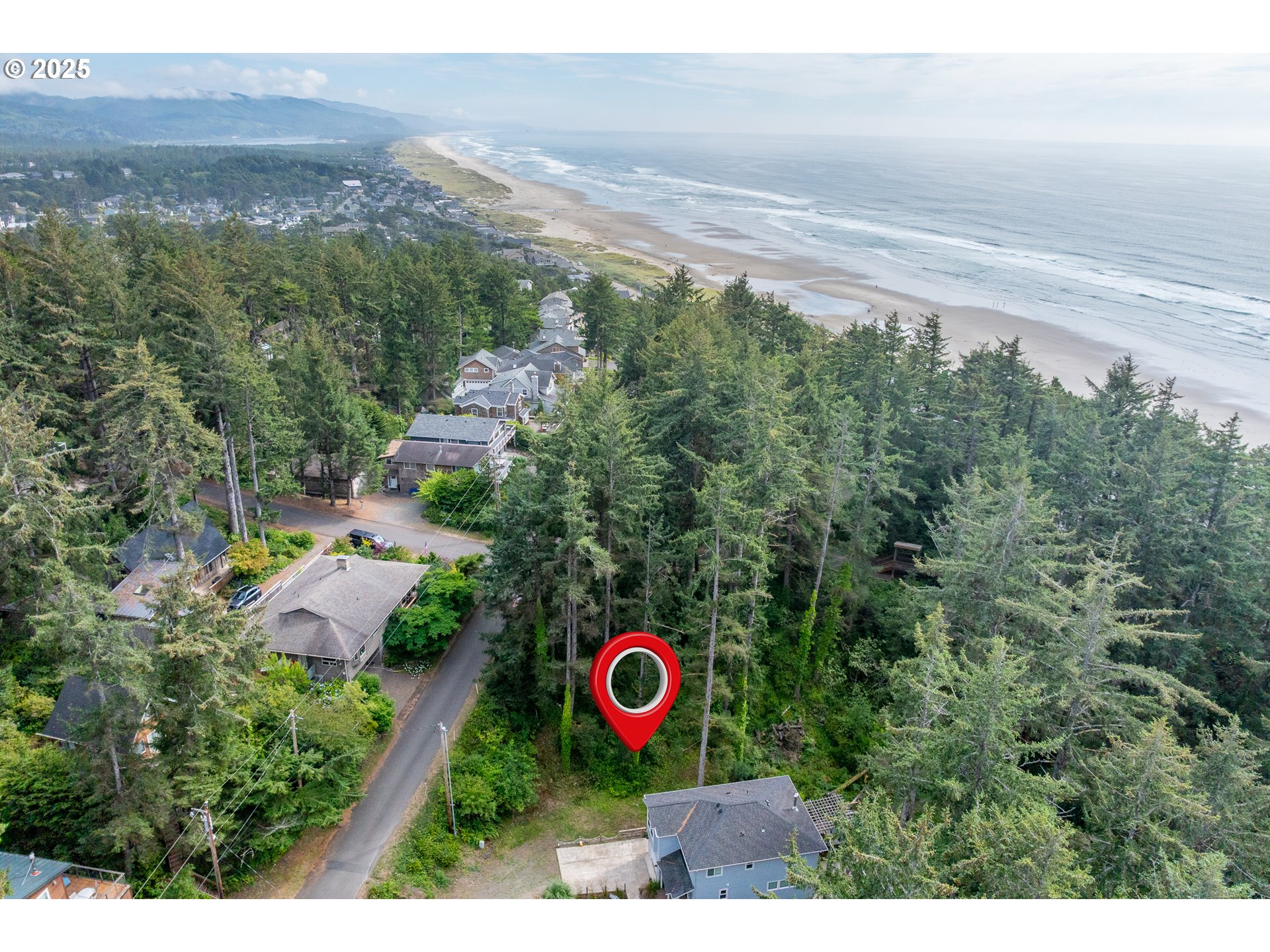 1503 Cherry Street Manzanita, OR 97130 - Photo 17 of 18 a view of a city and mountain